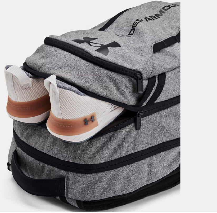 .Under Armour Hustle 6.0 BackPack - Castlerock Full Heather/Black - (1384672-026) - C25