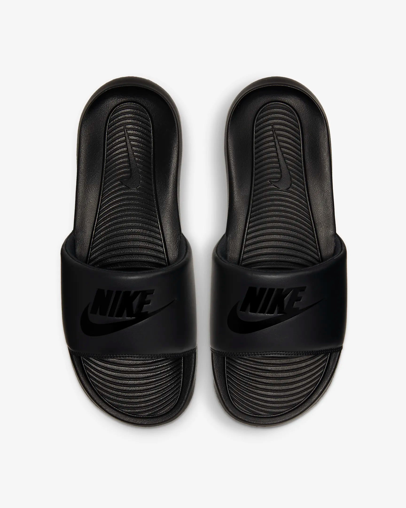 Black nike slides hotsell