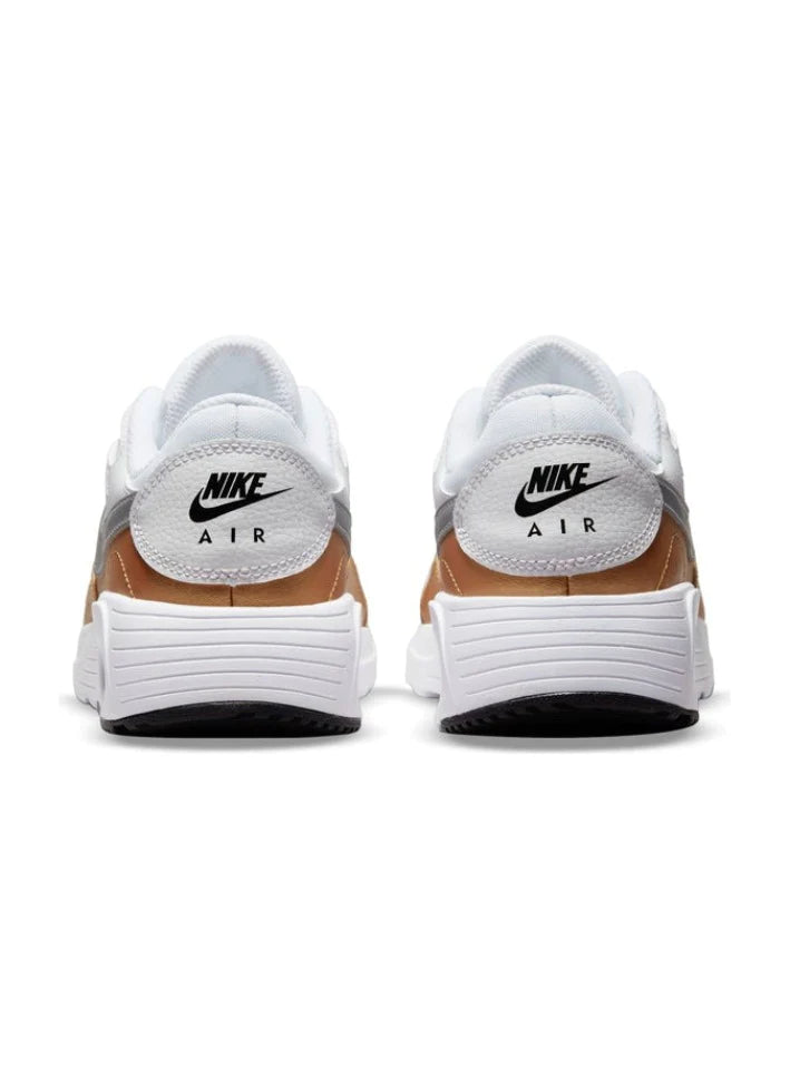 Womens white and gold 2025 nike trainers